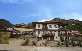 Tümü