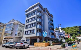 Tümü